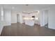 Modern kitchen with white cabinets, quartz countertops and stainless steel appliances at 9136 Gulf Haven Dr, Parrish, FL 34219