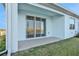 Covered patio with sliding glass doors leading to the backyard at 9136 Gulf Haven Dr, Parrish, FL 34219