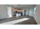 Open kitchen features modern cabinetry, granite countertops, and stainless steel appliances at 9105 Gulf Haven Dr, Parrish, FL 34219
