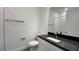 Bathroom features a single vanity, toilet and dark countertops at 9105 Gulf Haven Dr, Parrish, FL 34219