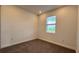 Cozy bedroom with neutral walls, carpeting and a window with blinds at 9105 Gulf Haven Dr, Parrish, FL 34219