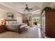 Spacious main bedroom with wood flooring and access to the pool at 254 Rotonda E Blvd, Rotonda West, FL 33947