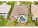 Property with a large, screened-in pool at 254 Rotonda E Blvd, Rotonda West, FL 33947