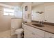 Clean bathroom with shower, toilet, and vanity at 254 Rotonda E Blvd, Rotonda West, FL 33947
