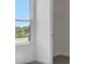 Bedroom with window and view to the outside, and doorway to closet at 9043 Duany Ln, Lakewood Ranch, FL 34240