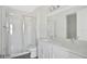 Modern bathroom with double vanity and shower at 9144 Gulf Haven Dr, Parrish, FL 34219