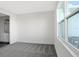Cozy bedroom with grey carpet and large window at 9144 Gulf Haven Dr, Parrish, FL 34219