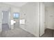 Well-lit hallway with doors to bedrooms and bath at 9144 Gulf Haven Dr, Parrish, FL 34219