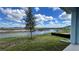 Backyard view of a canal and lush landscaping at 9222 Gulf Haven Dr, Parrish, FL 34219