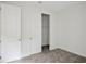 Spacious bedroom with neutral walls, carpet, and a large closet at 7474 Sea Manatee St, Parrish, FL 34219