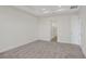 Bedroom with carpet and access to bathroom at 7474 Sea Manatee St, Parrish, FL 34219