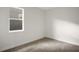 Simple bedroom with carpet and a window at 7474 Sea Manatee St, Parrish, FL 34219