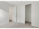 Bright bedroom with neutral walls, carpet, and a spacious closet at 7474 Sea Manatee St, Parrish, FL 34219