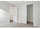 Bright bedroom with neutral walls, carpet, and a spacious closet at 7474 Sea Manatee St, Parrish, FL 34219