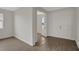Bright entryway with hardwood floors and an open concept floor plan at 7474 Sea Manatee St, Parrish, FL 34219
