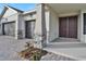 Front entrance with double doors and stone columns at 7474 Sea Manatee St, Parrish, FL 34219