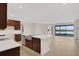 Modern kitchen with stainless steel appliances and an island at 7474 Sea Manatee St, Parrish, FL 34219
