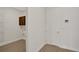 Laundry room with wood cabinets and built-in shelving at 7474 Sea Manatee St, Parrish, FL 34219