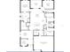 A three-bedroom, three-bath floor plan with a three-car garage and covered patio at 7474 Sea Manatee St, Parrish, FL 34219