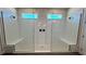 Spacious double shower with built-in seating and glass enclosure at 7490 Sea Manatee St, Parrish, FL 34219