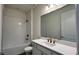 Clean bathroom with single vanity and bathtub at 7490 Sea Manatee St, Parrish, FL 34219