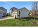 Spacious two-car garage with a large driveway and well-maintained lawn at 9031 Duany Ln, Lakewood Ranch, FL 34240