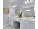 Modern bathroom with double vanity and plenty of counter space at 7458 Sea Manatee St, Parrish, FL 34219