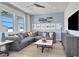 Game room featuring sectional sofa and game-themed decor at 7458 Sea Manatee St, Parrish, FL 34219