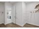Bright walk-in closet with custom shelving and rods at 7458 Sea Manatee St, Parrish, FL 34219