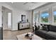 Game room with sectional sofa and built-in cabinet at 7458 Sea Manatee St, Parrish, FL 34219