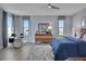 Spacious bedroom with a large bed and drum set at 7458 Sea Manatee St, Parrish, FL 34219
