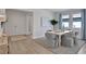 Bright dining room with a modern table and comfortable seating at 7458 Sea Manatee St, Parrish, FL 34219