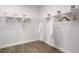 Large walk-in closet with ample shelving and hanging space at 7458 Sea Manatee St, Parrish, FL 34219