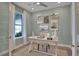 Bright home office with built in desk and natural light at 7458 Sea Manatee St, Parrish, FL 34219
