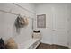 Convenient drop zone with built-in bench and hooks for backpacks at 7458 Sea Manatee St, Parrish, FL 34219