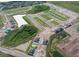 Aerial view of community with various home styles and landscaping at 9230 Gulf Haven Dr, Parrish, FL 34219