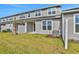 Private backyard with grass lawn and fenced patio at 9246 Gulf Haven Dr, Parrish, FL 34219