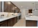 Bright kitchen with white countertops and stainless steel appliances at 7438 Sea Manatee St, Parrish, FL 34219
