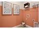 Laundry room with shelving and a modern aesthetic at 7438 Sea Manatee St, Parrish, FL 34219