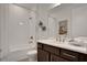 Clean bathroom with a shower/tub combo and modern vanity at 7438 Sea Manatee St, Parrish, FL 34219