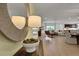 Open concept living area with dining and kitchen, hardwood floors at 7438 Sea Manatee St, Parrish, FL 34219