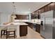 Modern kitchen with stainless steel appliances and an island at 7438 Sea Manatee St, Parrish, FL 34219