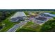 Aerial view of a new community with houses and lakes at 7438 Sea Manatee St, Parrish, FL 34219