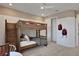 bedroom with a bunk bed and closet at 7438 Sea Manatee St, Parrish, FL 34219