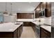 Modern kitchen with stainless steel appliances and ample cabinetry at 7434 Sea Manatee St, Parrish, FL 34219