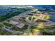 Aerial view of a vast new housing development with many ponds at 7434 Sea Manatee St, Parrish, FL 34219