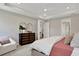 Main bedroom with ample space and view into living area at 7434 Sea Manatee St, Parrish, FL 34219