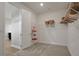 Spacious walk-in closet with shelving and hanging rods at 7434 Sea Manatee St, Parrish, FL 34219