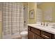 Clean bathroom with tub shower and updated vanity at 7434 Sea Manatee St, Parrish, FL 34219