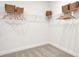 Large walk-in closet with ample hanging space at 7434 Sea Manatee St, Parrish, FL 34219